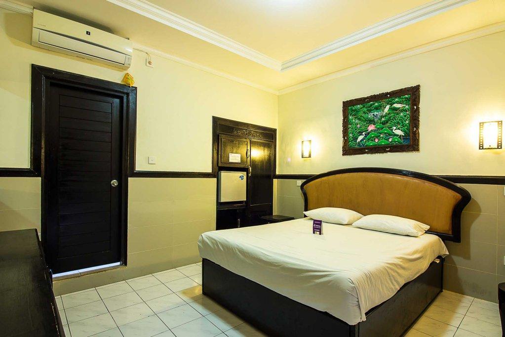 Hotel Sanjaya Managed By Tinggal Кута Екстер'єр фото